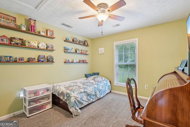 198 Lake Cv, Approach, Newnan, GA 30265 - bedroom featuring carpet flooring, baseboards, a ceiling fan, and a textured ceiling