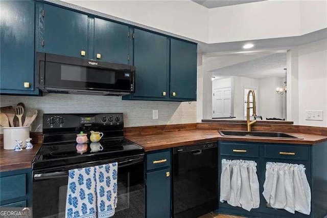 374 Dooley Rd, Dallas, GA 30132 - kitchen with black appliances, blue cabinetry, wooden counters, a sink, and backsplash