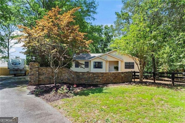 374 Dooley Rd, Dallas, GA 30132 - view of side of property featuring stone siding and driveway