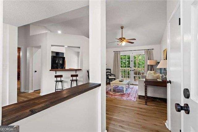 374 Dooley Rd, Dallas, GA 30132 - hall with wood finished floors, french doors, and vaulted ceiling