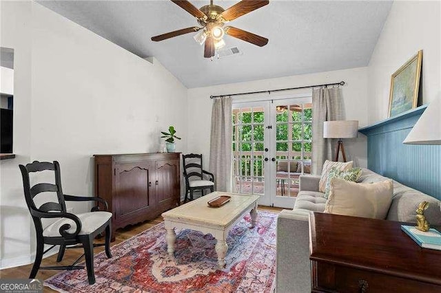 374 Dooley Rd, Dallas, GA 30132 - living room featuring vaulted ceiling, french doors, ceiling fan, wood finished floors, and baseboards