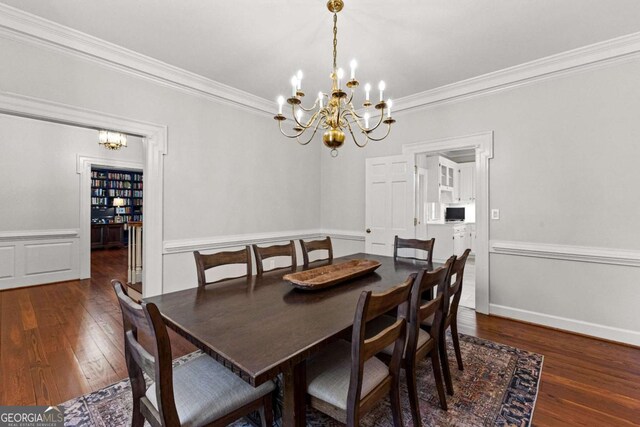 135 Mill Race Rd, Thomaston, GA 30286 - dining room featuring a chandelier, ornamental molding, and hardwood / wood-style floors