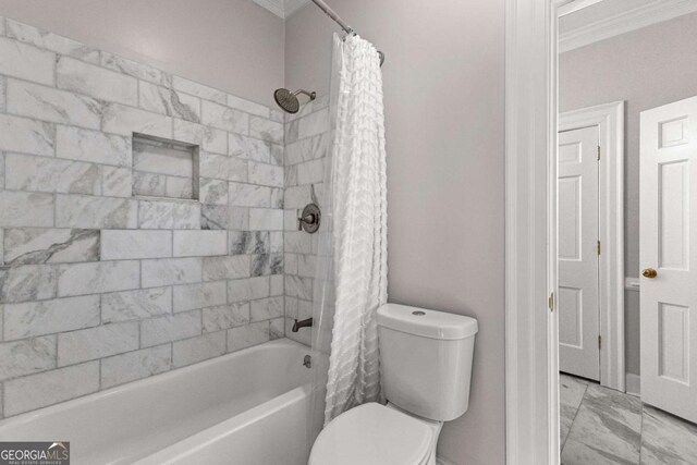 135 Mill Race Rd, Thomaston, GA 30286 - bathroom featuring ornamental molding, shower / bathtub combination with curtain, marble look tiles, and toilet