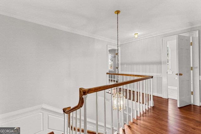135 Mill Race Rd, Thomaston, GA 30286 - stairway featuring wood finished floors and ornamental molding