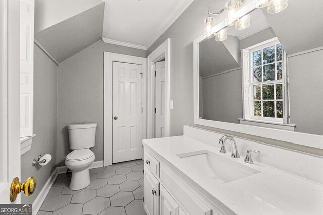 135 Mill Race Rd, Thomaston, GA 30286 - bathroom featuring toilet, vanity, ornamental molding, tile patterned flooring, and a chandelier