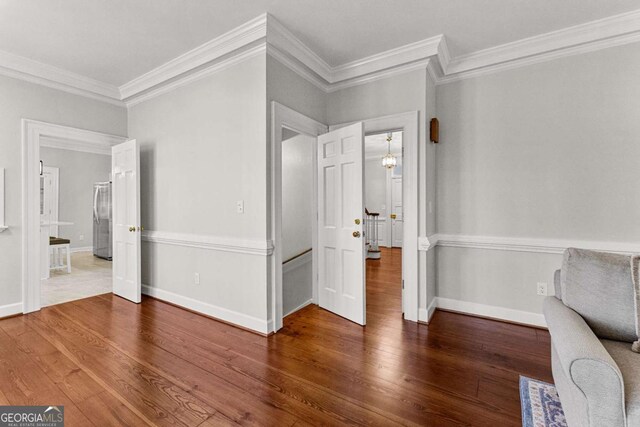135 Mill Race Rd, Thomaston, GA 30286 - foyer featuring crown molding, wood finished floors, and baseboards