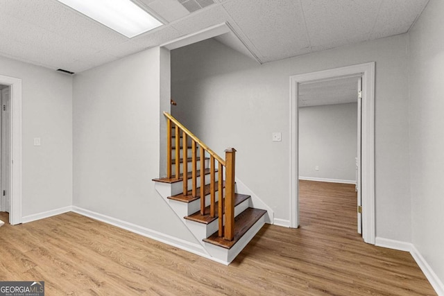 135 Mill Race Rd, Thomaston, GA 30286 - stairway featuring wood finished floors and baseboards