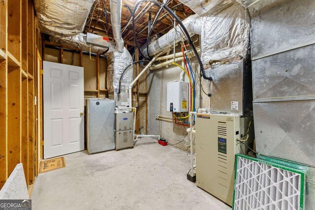 135 Mill Race Rd, Thomaston, GA 30286 - unfinished below grade area with tankless water heater