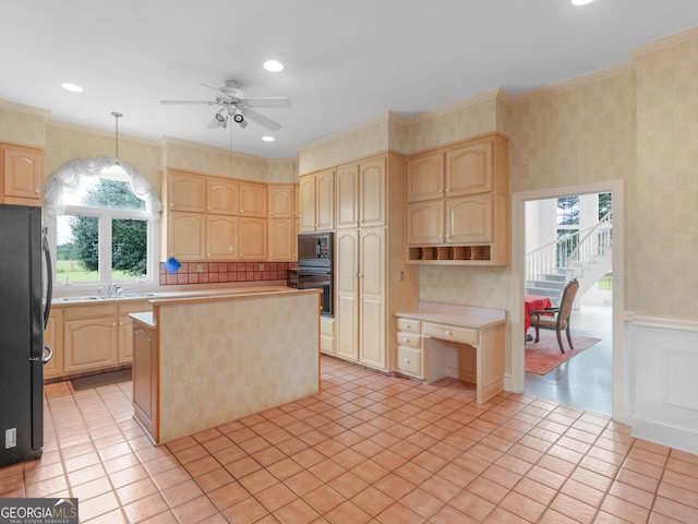 474 N Rover Rd, Williamson, GA 30292 - kitchen with light brown cabinetry, black appliances, ceiling fan, light countertops, and crown molding