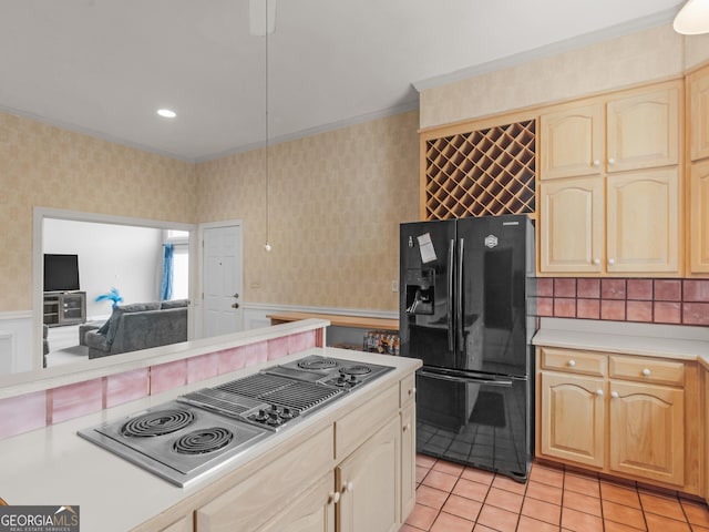 474 N Rover Rd, Williamson, GA 30292 - kitchen featuring black refrigerator with ice dispenser, stainless steel electric stovetop, crown molding, light countertops, and wallpapered walls