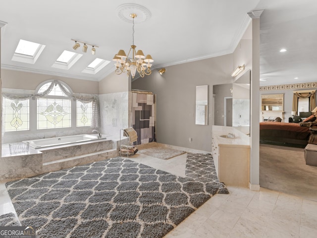 474 N Rover Rd, Williamson, GA 30292 - full bathroom featuring a garden tub, vanity, crown molding, a skylight, and a chandelier