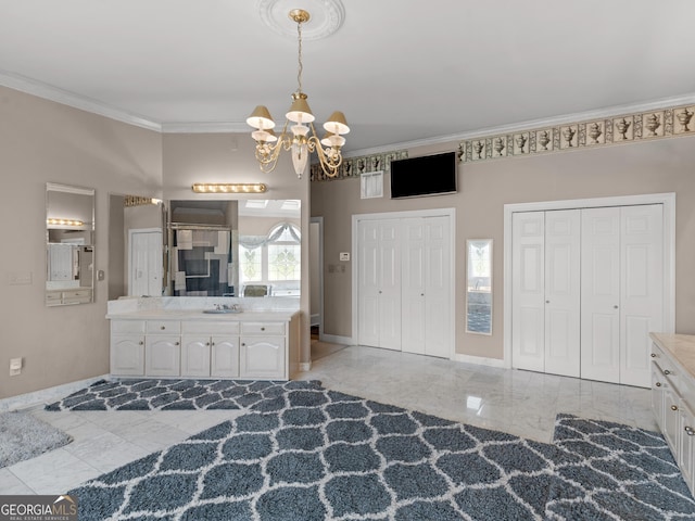 474 N Rover Rd, Williamson, GA 30292 - full bath with ornamental molding, a chandelier, vanity, a closet, and marble look tile flooring