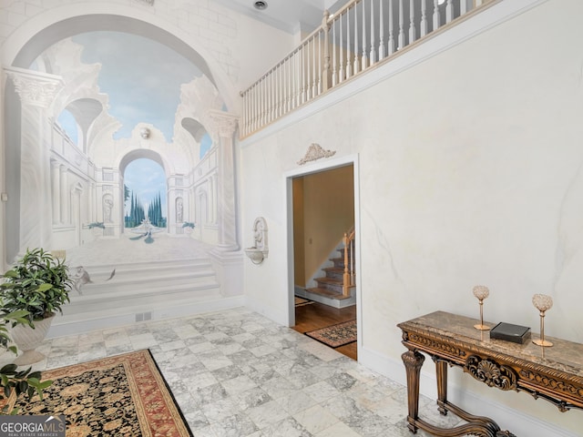 474 N Rover Rd, Williamson, GA 30292 - foyer featuring stairway, a towering ceiling, and baseboards