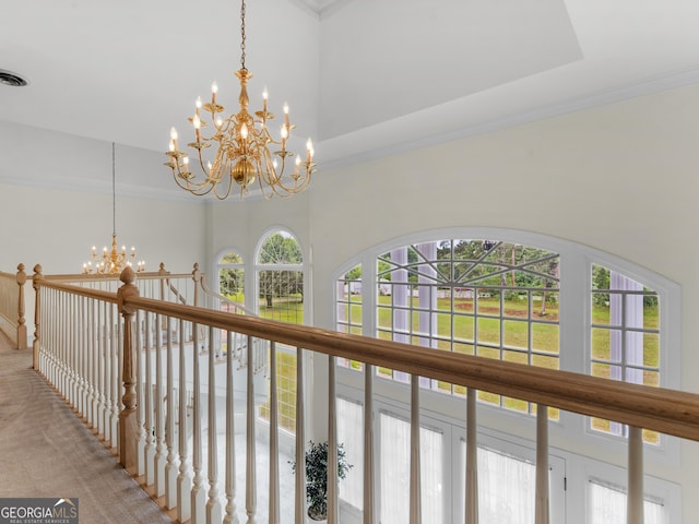 474 N Rover Rd, Williamson, GA 30292 - hall featuring a chandelier, ornamental molding, a towering ceiling, and light carpet