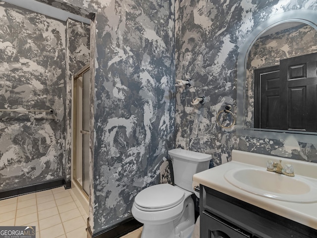 474 N Rover Rd, Williamson, GA 30292 - full bathroom featuring wallpapered walls, a shower stall, vanity, tile patterned flooring, and toilet