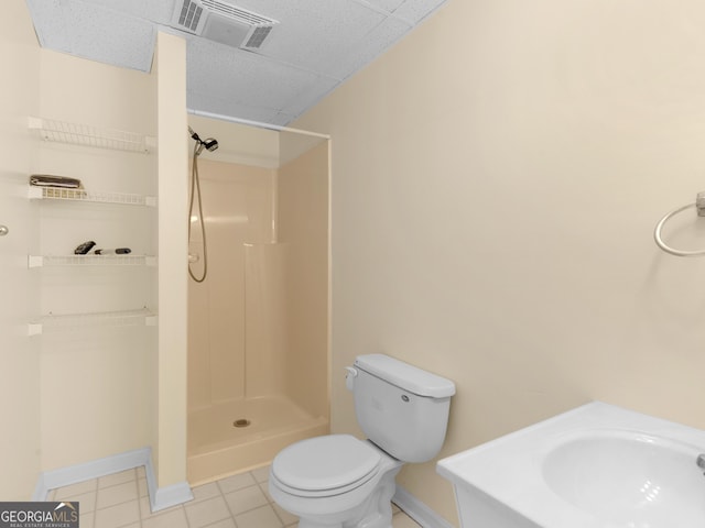 474 N Rover Rd, Williamson, GA 30292 - full bath with baseboards, toilet, a shower, a sink, and tile patterned flooring