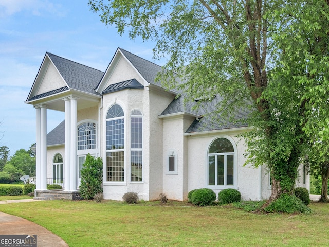 474 N Rover Rd, Williamson, GA 30292 - view of front of property featuring stucco siding, a front lawn, and roof with shingles