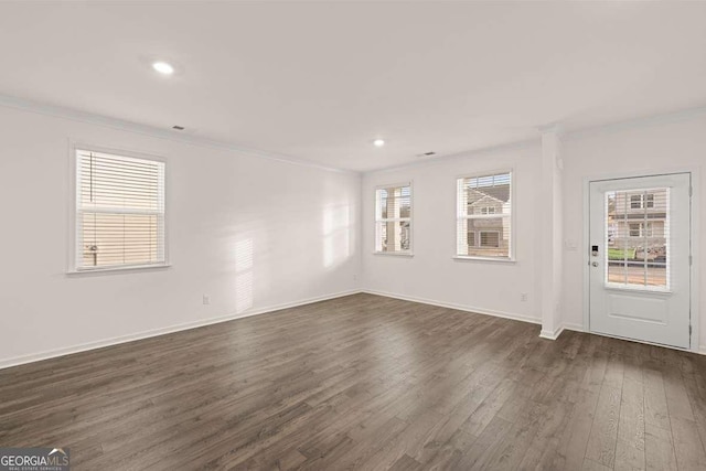 1159 Blue Juniper Cir, Loganville, GA 30052 - entryway featuring ornamental molding, dark wood finished floors, baseboards, and recessed lighting