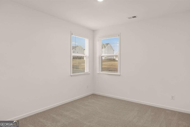 1159 Blue Juniper Cir, Loganville, GA 30052 - unfurnished room with carpet floors and baseboards