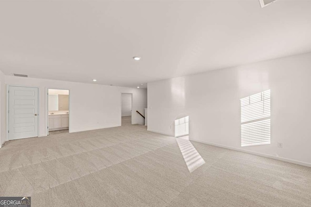 1159 Blue Juniper Cir, Loganville, GA 30052 - unfurnished room featuring light colored carpet, recessed lighting, and baseboards