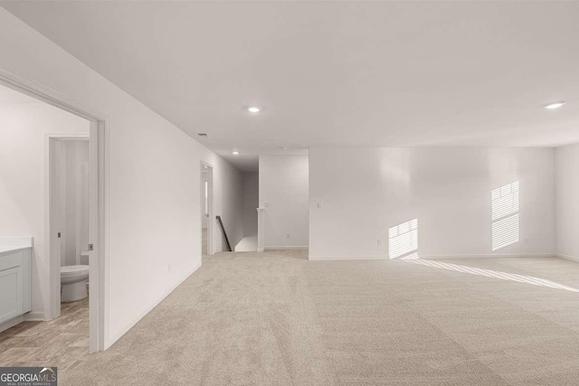 1159 Blue Juniper Cir, Loganville, GA 30052 - unfurnished room featuring recessed lighting, light carpet, and baseboards