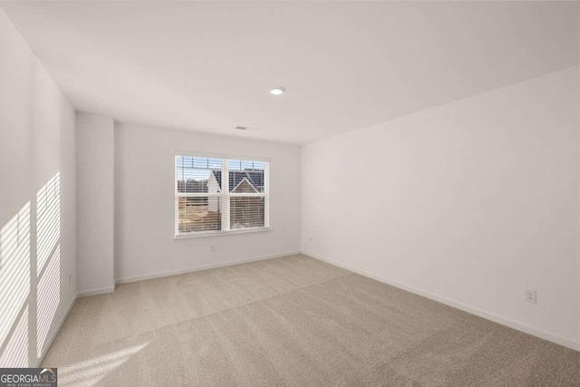 1159 Blue Juniper Cir, Loganville, GA 30052 - carpeted empty room with baseboards and recessed lighting