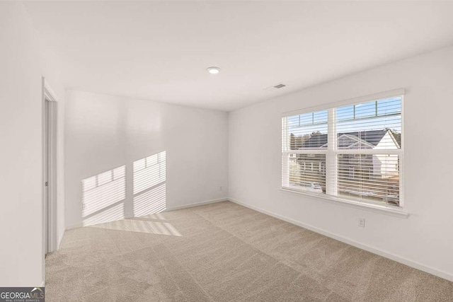 1159 Blue Juniper Cir, Loganville, GA 30052 - spare room with carpet floors, baseboards, and recessed lighting