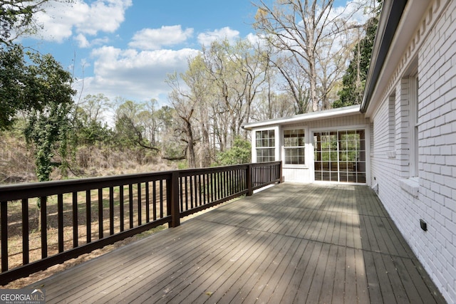 1483 Madison Rd, Monticello, GA 31064 - wooden deck featuring a sunroom