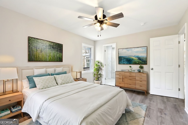 1483 Madison Rd, Monticello, GA 31064 - bedroom with wood finished floors and ceiling fan