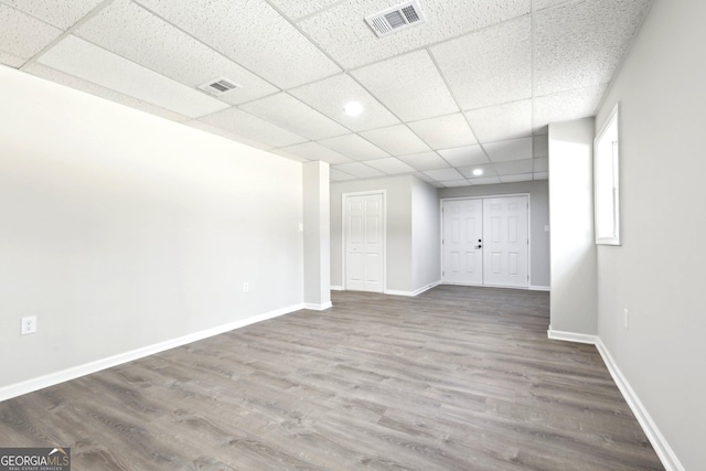 1483 Madison Rd, Monticello, GA 31064 - empty room with a paneled ceiling, wood finished floors, baseboards, and recessed lighting