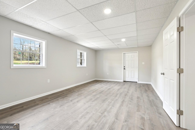 1483 Madison Rd, Monticello, GA 31064 - unfurnished room with a drop ceiling, wood finished floors, and baseboards