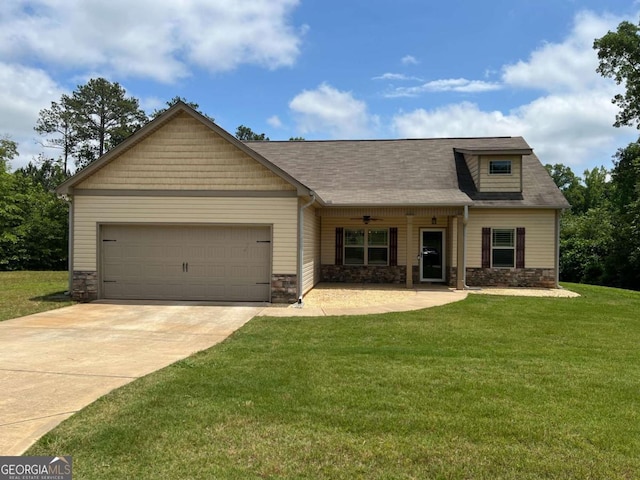 1010 Holliday Pass, Griffin, GA 30223 - view of front of house featuring stone siding, an attached garage, concrete driveway, and a front yard