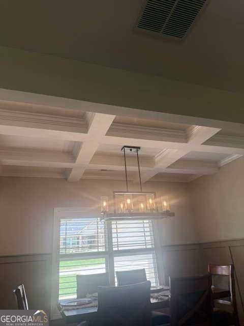 1010 Holliday Pass, Griffin, GA 30223 - dining space with coffered ceiling, beam ceiling, a desk, a wainscoted wall, and ornamental molding