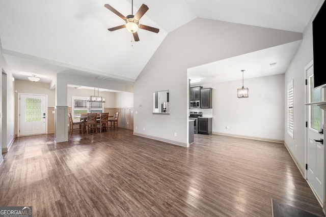 1010 Holliday Pass, Griffin, GA 30223 - living area with a chandelier, high vaulted ceiling, wood finished floors, and a ceiling fan