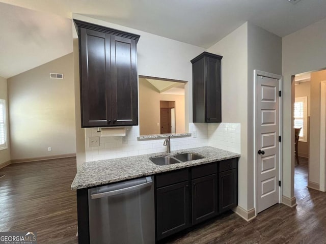 1010 Holliday Pass, Griffin, GA 30223 - kitchen with stainless steel dishwasher, a sink, dark wood finished floors, and healthy amount of natural light
