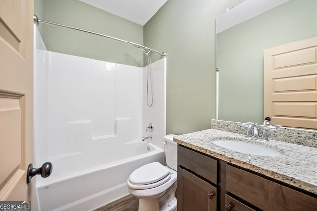 1010 Holliday Pass, Griffin, GA 30223 - bathroom featuring vanity, washtub / shower combination, and wood finished floors
