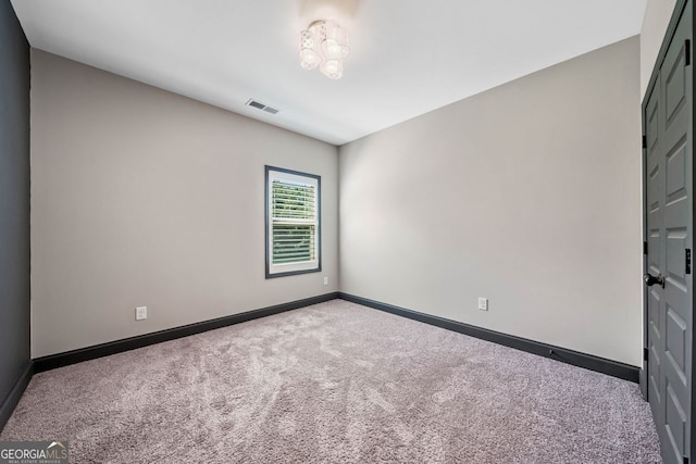 1010 Holliday Pass, Griffin, GA 30223 - unfurnished room with carpet and baseboards