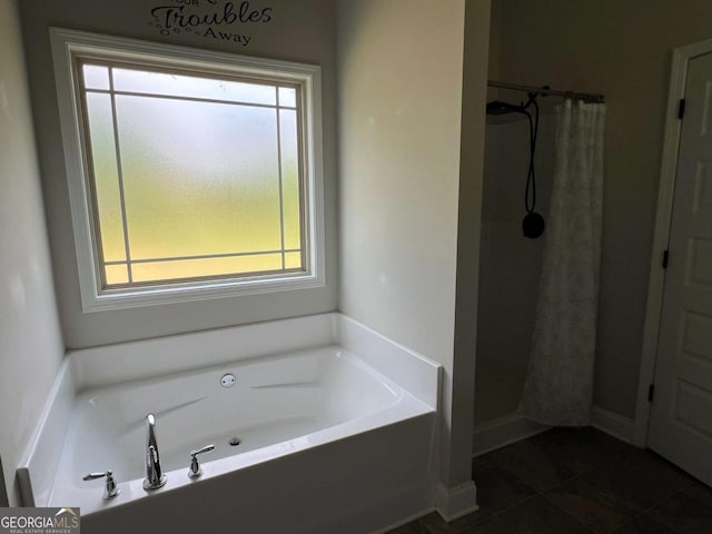 1010 Holliday Pass, Griffin, GA 30223 - full bath with a bath, tile patterned floors, and curtained shower