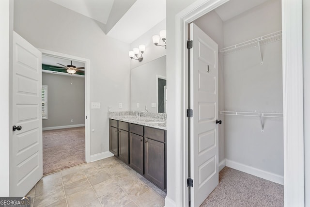 1010 Holliday Pass, Griffin, GA 30223 - full bath featuring double vanity, ceiling fan, and a spacious closet