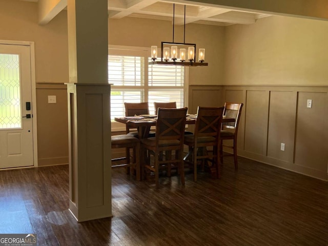1010 Holliday Pass, Griffin, GA 30223 - dining area featuring a decorative wall, coffered ceiling, beamed ceiling, a chandelier, and dark wood-type flooring