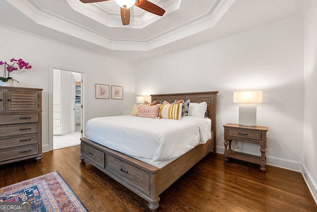 3714 Westbrooke Cir, Brookhaven, GA 30319 - bedroom with a raised ceiling, crown molding, wood finished floors, ceiling fan, and baseboards
