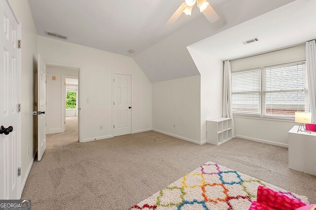 3714 Westbrooke Cir, Brookhaven, GA 30319 - recreation room featuring carpet, lofted ceiling, a ceiling fan, and baseboards