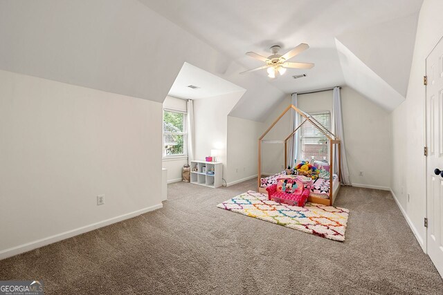 3714 Westbrooke Cir, Brookhaven, GA 30319 - playroom featuring carpet floors, lofted ceiling, a ceiling fan, and baseboards