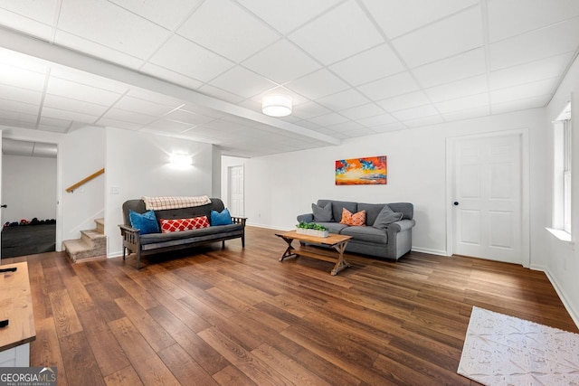 3714 Westbrooke Cir, Brookhaven, GA 30319 - living area featuring wood finished floors, a paneled ceiling, stairway, and baseboards