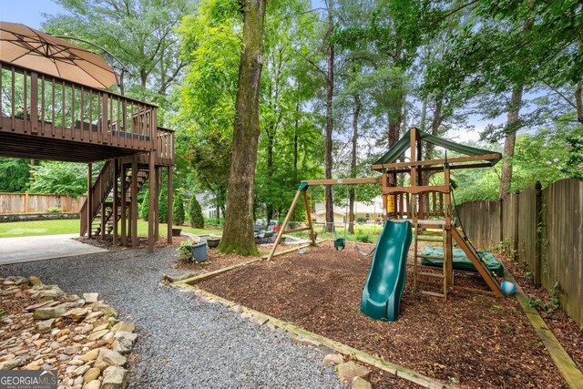 3714 Westbrooke Cir, Brookhaven, GA 30319 - view of play area with stairs and a wooden deck