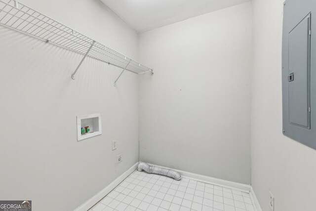 1177 Arlington Ave SW, Atlanta, GA 30310 - laundry room with hookup for a washing machine, electric panel, baseboards, and light tile patterned flooring