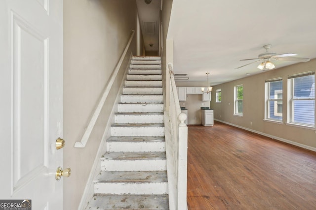 1177 Arlington Ave SW, Atlanta, GA 30310 - staircase featuring baseboards, ceiling fan, and wood finished floors