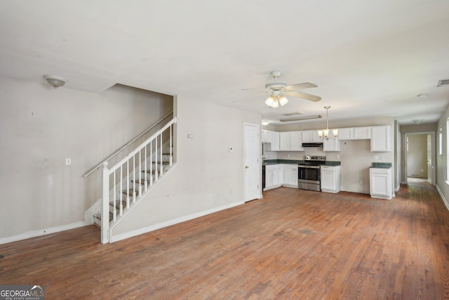 1177 Arlington Ave SW, Atlanta, GA 30310 - unfurnished living room with baseboards, ceiling fan, wood finished floors, and stairway