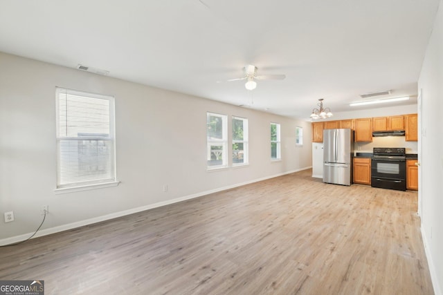 1177 Arlington Ave SW, Atlanta, GA 30310 - unfurnished living room with a chandelier, light wood-style flooring, a ceiling fan, and baseboards