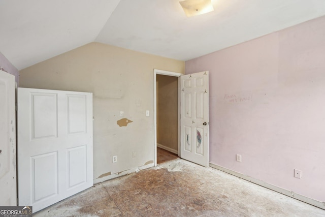 1177 Arlington Ave SW, Atlanta, GA 30310 - unfurnished bedroom featuring lofted ceiling